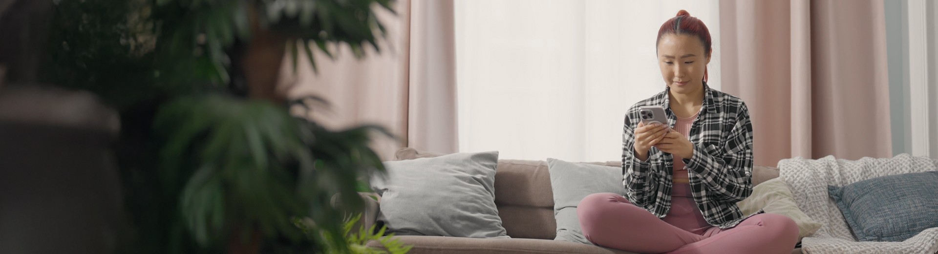 Woman looking to GLS parcelshop map